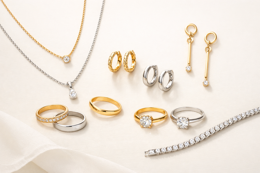 Premium anti-tarnish jewellery displayed on a soft ivory background featuring gold and silver necklaces, rings, and earrings for daily wear