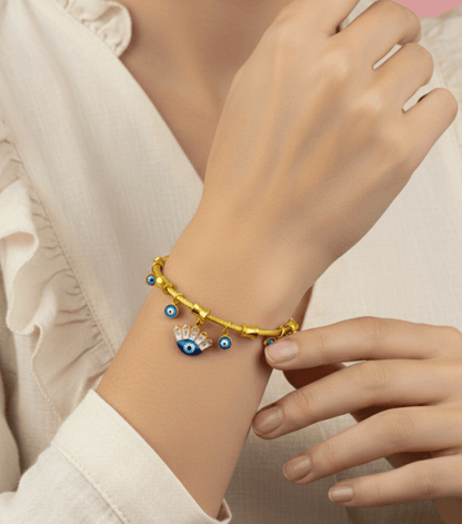 Woman wearing an Evil Eye Charm Bracelet